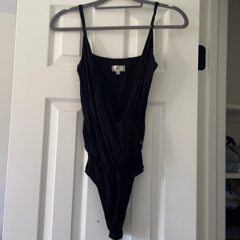NYTT black body suit. Never worn. Size XS.
